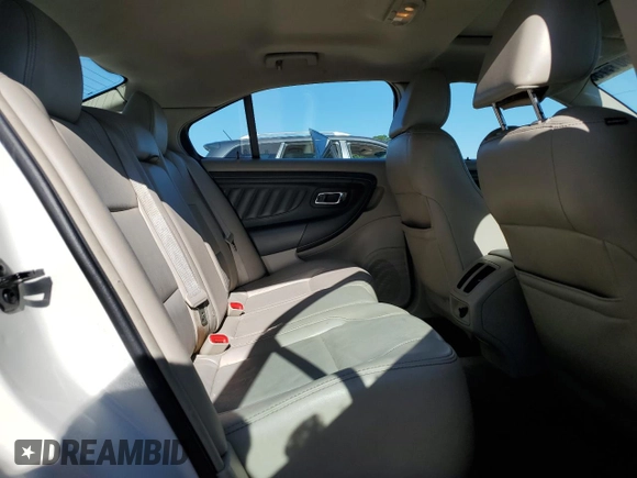 2011 Ford Taurus SEL z VIN 1FAHP2EW2BG188513, wystawiony jako Copart lot #58017755 z przebiegiem 211 530 mil mil oraz Szkoda całkowita • Salvage title. Historia ofert i sprzedaży dostępna na DreamBid. Obrazek 10.