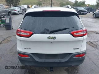 2015 Jeep Cherokee Latitude with VIN 1C4PJMCB1FW751758, listed as a IAAI auction lot 41767154 with 160,349 mi miles. Bid and sale history available at carsss.com. Image 16.