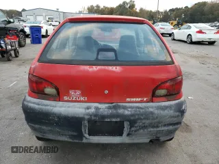 2001 Suzuki Swift GA z VIN 2S2AB21H216604405, wystawiony jako Copart lot #80427254 z przebiegiem 63 703 mil mil oraz Tytuł czysty. Historia ofert i sprzedaży dostępna na DreamBid. Obrazek 6.