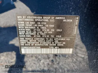 2018 Volkswagen Atlas SEL Premium z VIN 1V2NR2CA6JC577688, wystawiony jako Copart lot #60800465 z przebiegiem 82 841 mil mil oraz Szkoda całkowita • Salvage title. Historia ofert i sprzedaży dostępna na DreamBid. Obrazek 13.