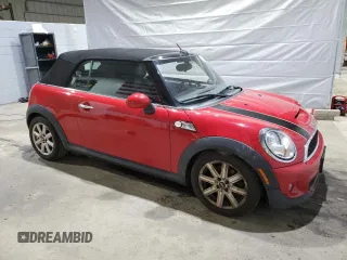 2014 MINI Convertible S z VIN WMWZP3C5XET706388, wystawiony jako Copart lot #51065435 z przebiegiem 122 379 mil mil oraz Szkoda całkowita • Salvage title. Historia ofert i sprzedaży dostępna na DreamBid. Obrazek 4.