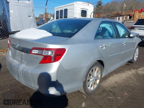 2014 Toyota Camry SE with VIN 4T1BK1FK6EU548176, listed as a IAAI auction lot 41392975 with 143,249 mi miles. Bid and sale history available at carsss.com. Image 4.