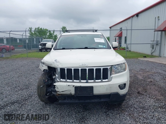 2011 Jeep Grand Cherokee Laredo with VIN 1J4RR4GG6BC680943, listed as a IAAI auction lot 42419575 with 188,672 mi miles and . Bid and sale history available at DreamBid. Image 12.