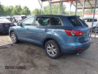 2014 Mazda CX-9 Touring with VIN JM3TB3CV7E0440747, listed as a IAAI auction lot 42457709 with 166,588 mi miles and . Bid and sale history available at DreamBid. Image 3.