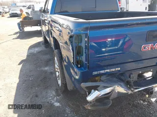 2018 GMC Sierra 1500 SLT z VIN 3GTU2NEC8JG254323, wystawiony jako IAAI lot #41772180 z przebiegiem 157 143 mil mil oraz . Historia ofert i sprzedaży dostępna na DreamBid. Obrazek 20.