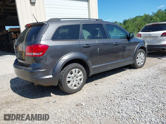 2015 Dodge Journey American Value z VIN 3C4PDCAB2FT565933, wystawiony jako IAAI lot #42327885 z przebiegiem 177 544 mil mil oraz . Historia ofert i sprzedaży dostępna na DreamBid. Obrazek 4.
