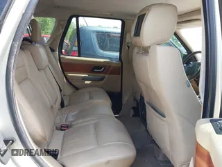 2006 Land Rover Range Rover Sport HSE z VIN SALSF25436A970841, wystawiony jako IAAI lot #42152175 z przebiegiem 254 024 mil mil oraz . Historia ofert i sprzedaży dostępna na DreamBid. Obrazek 8.