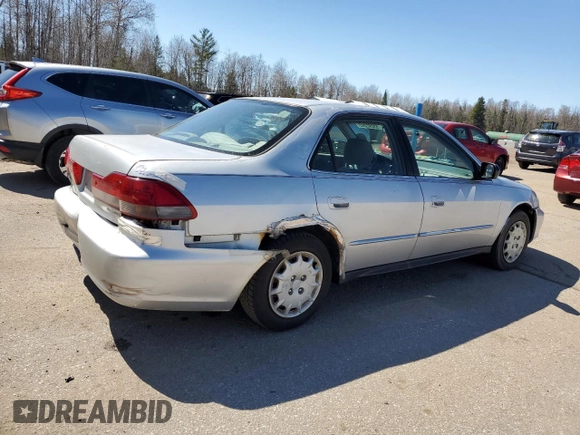 2002 Honda Accord LX z VIN 1HGCG56402A160961, wystawiony jako Copart lot #53092205 z przebiegiem 262 152 mil mil oraz Czysty tytuł • Clean title. Historia ofert i sprzedaży dostępna na DreamBid. Obrazek 3.
