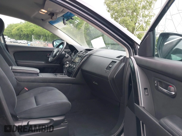 2015 Mazda CX-9 Sport with VIN JM3TB3BV1F0466070, listed as a IAAI auction lot 42350686 with 110,818 mi miles and . Bid and sale history available at DreamBid. Image 5.