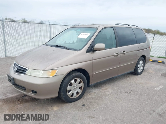 2004 Honda Odyssey EX-L with VIN 5FNRL18744B034830, listed as a IAAI auction lot 42052008 with 182,178 mi miles and . Bid and sale history available at DreamBid. Image 2.