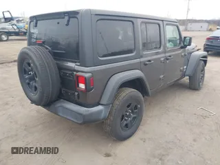 2019 Jeep Wrangler Unlimited Sport Altitude with VIN 1C4HJXDG0KW559807, listed as a IAAI auction lot 41790082 with 34,221 mi miles and . Bid and sale history available at DreamBid. Image 4.