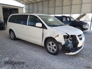 2013 Dodge Grand Caravan SXT with VIN 2C4RDGCG5DR554126, listed as a Copart auction lot 52160805 with 201,161 mi miles and Salvage Title. Bid and sale history available at DreamBid. Image 4.