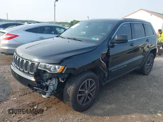 2017 Jeep Grand Cherokee Laredo with VIN 1C4RJFAG0HC706155, listed as a IAAI auction lot 42452967 with 144,925 mi miles and . Bid and sale history available at DreamBid. Image 17.