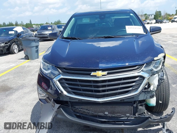 2020 Chevrolet Equinox LT with VIN 3GNAXJEV5LS592266, listed as a IAAI auction lot 41924328 with 61,574 mi miles and . Bid and sale history available at DreamBid. Image 6.