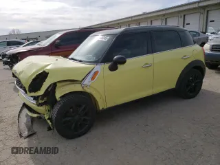 2012 MINI Countryman with VIN WMWZB3C58CWM05659, listed as a Copart auction lot 50085845 with 99,748 mi miles and Salvage title. Bid and sale history available at DreamBid. Image 1.