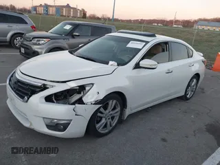 2015 Nissan Altima SL with VIN 1N4BL3AP0FC141421, listed as a IAAI auction lot 40999595 with 175,437 mi miles and . Bid and sale history available at DreamBid. Image 2.