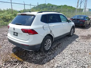 2018 Volkswagen Tiguan SEL with VIN 3VV3B7AX2JM060292, listed as a IAAI auction lot 42274534 with 97,604 mi miles and . Bid and sale history available at DreamBid. Image 4.
