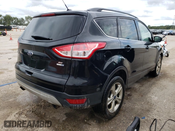 2014 Ford Escape SE with VIN 1FMCU9G99EUE48159, listed as a Copart auction lot 66864794 with 175,990 mi miles and Salvage Title. Bid and sale history available at DreamBid. Image 3.
