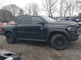 2022 Ram 1500 TRX with VIN 1C6SRFU9XNN476106, listed as a IAAI auction lot 41627895 with 21,992 mi miles and . Bid and sale history available at DreamBid. Image 13.