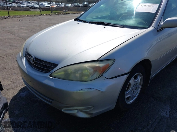 2003 Toyota Camry LE z VIN 4T1BF32K93U053750, wystawiony jako IAAI lot #41930830 z przebiegiem Nie podano mil oraz . Historia ofert i sprzedaży dostępna na DreamBid. Obrazek 6.