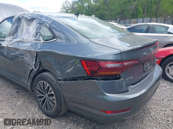 2019 Volkswagen Jetta S z VIN 3VWC57BUXKM121316, wystawiony jako IAAI lot #42290107 z przebiegiem 117 371 mil mil oraz . Historia ofert i sprzedaży dostępna na DreamBid. Obrazek 6.