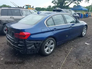 2018 BMW 3 Series 330i xDrive with VIN WBA8D9C52JA608243, listed as a IAAI auction lot 42630988 with 48,015 mi miles and . Bid and sale history available at DreamBid. Image 4.