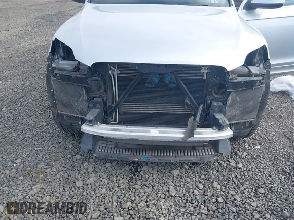 2014 Audi Q7 3.0T Premium Plus with VIN WA1LGAFE0ED015237, listed as a IAAI auction lot 41671129 with 114,410 mi miles. Bid and sale history available at carsss.com. Image 6.
