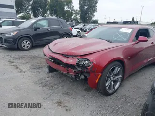 2021 Chevrolet Camaro 1LT with VIN 1G1FB1RX9M0107010, listed as a IAAI auction lot 42629591 with 65,450 mi miles and . Bid and sale history available at DreamBid. Image 21.