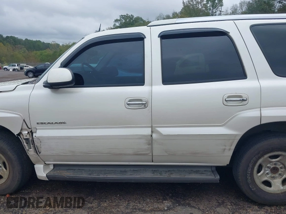 2005 Cadillac Escalade z VIN 1GYEC63TX5R125669, wystawiony jako IAAI lot #40783533 z przebiegiem 364 924 mil mil oraz . Historia ofert i sprzedaży dostępna na DreamBid. Obrazek 14.