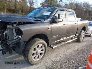 2023 Ram 2500 Big Horn with VIN 3C6UR5DL6PG519124, listed as a IAAI auction lot 41851548 with 10,334 mi miles. Bid and sale history available at carsss.com. Image 2.