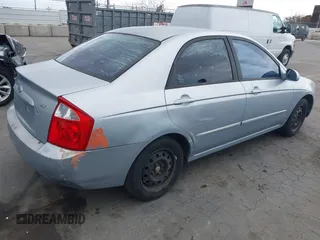 2005 Kia Spectra LX with VIN KNAFE121755142490, listed as a IAAI auction lot 42085928 with 170,406 mi miles. Bid and sale history available at carsss.com. Image 4.