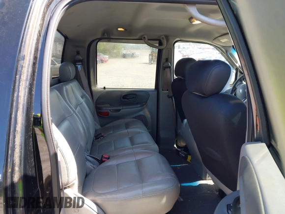 2003 Ford F-150 XLT with VIN 1FTRW07653KC18900, listed as a IAAI auction lot 41979710 with 99,525 mi miles. Bid and sale history available at carsss.com. Image 8.