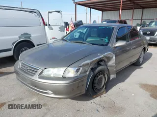 2001 Toyota Camry CE z VIN 4T1BG22K31U069513, wystawiony jako IAAI lot #42243673 z przebiegiem 137 241 mil mil oraz . Historia ofert i sprzedaży dostępna na DreamBid. Obrazek 17.