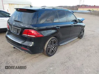 2018 Mercedes-Benz GLE 43 AMG with VIN 4JGDA6EB4JB115925, listed as a IAAI auction lot 40773468 with 52,579 mi miles and . Bid and sale history available at DreamBid. Image 4.