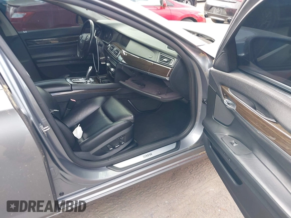 2010 BMW 7 Series 750Li xDrive with VIN WBAKC8C51ACY68317, listed as a IAAI auction lot 42210033 with 124,765 mi miles and . Bid and sale history available at DreamBid. Image 5.