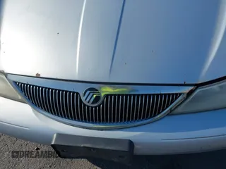 2000 Mercury Mystique z VIN 3MEFM6531YM604135, wystawiony jako IAAI lot #42148329 z przebiegiem 179 798 mil mil oraz . Historia ofert i sprzedaży dostępna na DreamBid. Obrazek 6.