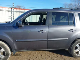 2015 Honda Pilot EX-L with VIN 5FNYF4H59FB060023, listed as a IAAI auction lot 41327793 with 197,981 mi miles and . Bid and sale history available at carsss.com. Image 13.