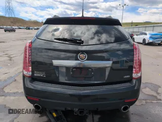 2014 Cadillac SRX Premium Collection z VIN 3GYFNGE34ES676646, wystawiony jako Copart lot #53478695 z przebiegiem 115 096 mil mil oraz Szkoda całkowita • Salvage title. Historia ofert i sprzedaży dostępna na DreamBid. Obrazek 6.