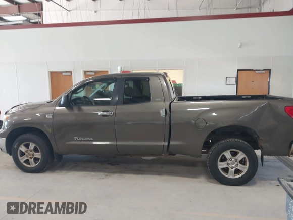 2007 Toyota Tundra SR5 with VIN 5TFBT54137X006800, listed as a IAAI auction lot 42061641 with 186,139 mi miles and . Bid and sale history available at DreamBid. Image 14.