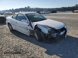 1999 Pontiac Grand Am GT with VIN 1G2NW12EXXM754842, listed as a Copart auction lot 46940335 with 124,886 mi miles and Salvage Title. Bid and sale history available at carsss.com. Image 4.