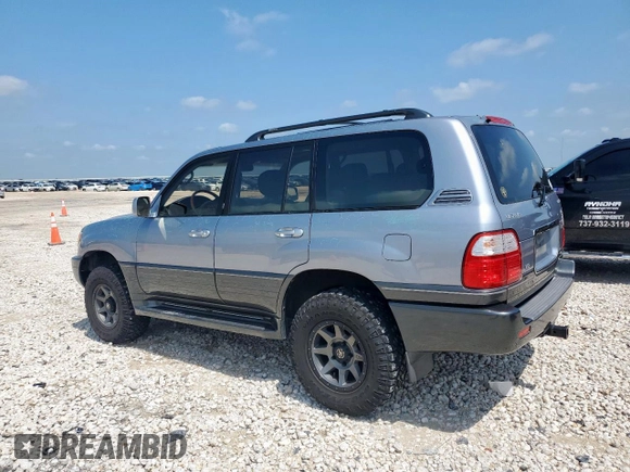 2001 Lexus LX 470 z VIN JTJHT00W313504330, wystawiony jako Copart lot #61126435 z przebiegiem 87 049 mil mil oraz Czysty tytuł • Clean title. Historia ofert i sprzedaży dostępna na DreamBid. Obrazek 2.