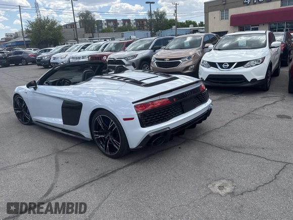 2021 Audi R8 Spyder performance z VIN WUA4BCFX5M7901463, wystawiony jako Copart lot #58416835 z przebiegiem 16 766 mil mil oraz Szkoda całkowita • Salvage title. Historia ofert i sprzedaży dostępna na DreamBid. Obrazek 3.