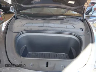 2023 Tesla Model Y Long Range with VIN 7SAYGDEE4PF875915, listed as a IAAI auction lot 42095178 with 11,928 mi miles and . Bid and sale history available at DreamBid. Image 10.