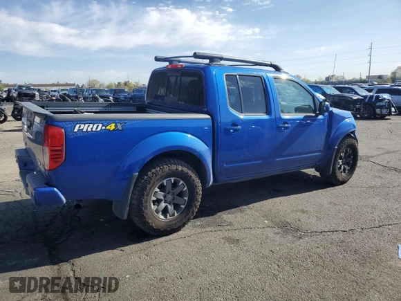 2015 Nissan Frontier Pro-4X with VIN 1N6AD0EV2FN736394, listed as a Copart auction lot 53916455 with 116,801 mi miles and Salvage title. Bid and sale history available at DreamBid. Image 3.