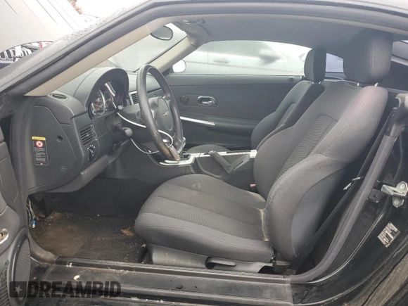 2005 Chrysler Crossfire z VIN 1C3AN59L35X030211, wystawiony jako Copart lot #77364144 z przebiegiem 91 198 mil mil oraz Czysty tytuł • Clean title. Historia ofert i sprzedaży dostępna na DreamBid. Obrazek 7.