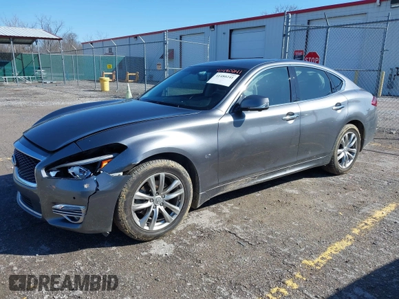 2018 Infiniti Q70 Luxe with VIN JN1BY1AR3JM220783, listed as a IAAI auction lot 41480241 with 95,739 mi miles and . Bid and sale history available at DreamBid. Image 17.