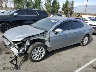 2024 Toyota Camry LE with VIN 4T1C11AK7RU898436, listed as a Copart auction lot 86216844 with 5,201 mi miles and Salvage Title. Bid and sale history available at carsss.com. Image 1.