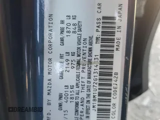 2016 Mazda 3 i Sport with VIN JM1BM1U72G1314831, listed as a Copart auction lot 53590235 with 100,547 mi miles and Salvage Title. Bid and sale history available at DreamBid. Image 13.