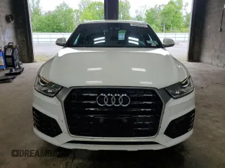 2018 Audi Q3 Premium with VIN WA1BCCFS9JR000127, listed as a Copart auction lot 58555755 with 60,295 mi miles and Salvage title. Bid and sale history available at DreamBid. Image 5.