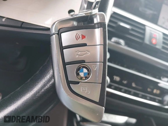 2019 BMW X4 xDrive30i with VIN 5UXUJ3C52KLG54945, listed as a IAAI auction lot 42083434 with 153,956 mi miles and . Bid and sale history available at DreamBid. Image 11.